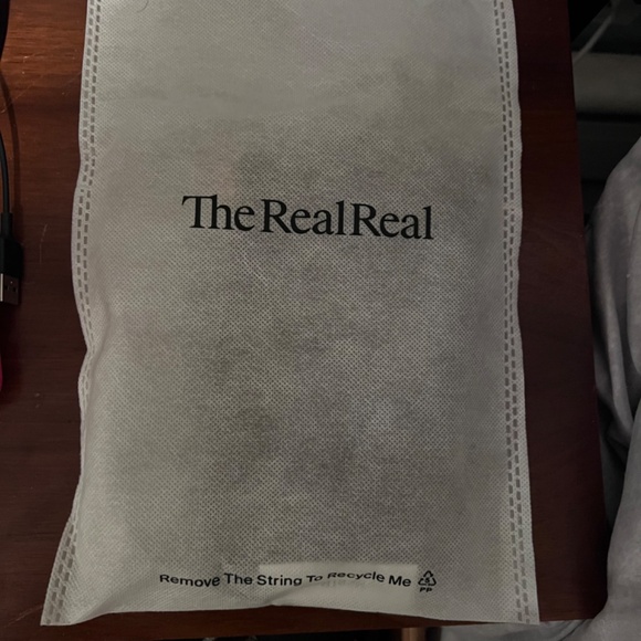 Louis Vuitton LV Monogram Empreinte Leather Wristlet - Picture 10 of 10